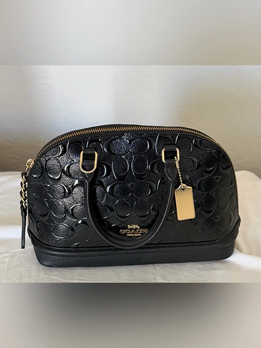 Coach glossy patent